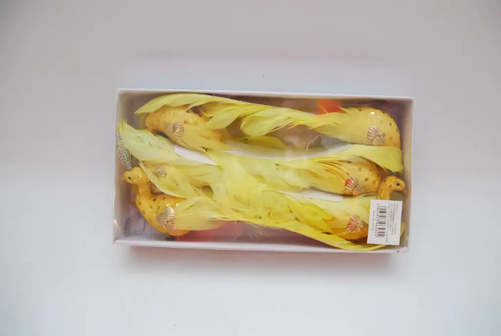 Lind traadil, pika sabaga, kollane